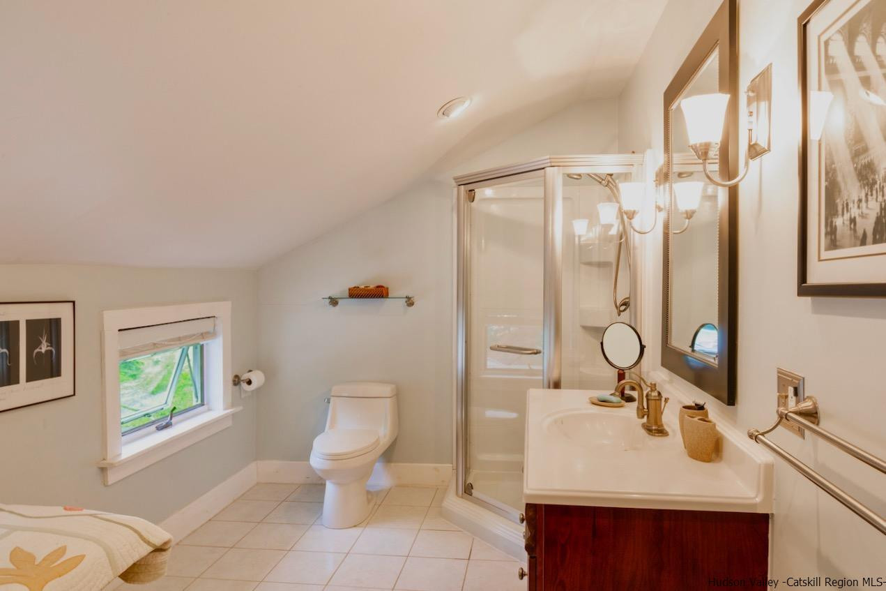 1182 Highway 208 Wallkill, NY 12589 - Photo 20 of 35 a bathroom with a sink toilet and shower