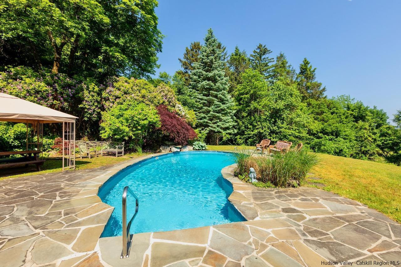 1182 Highway 208 Wallkill, NY 12589 - Photo 26 of 35 a view of a backyard with plants and patio