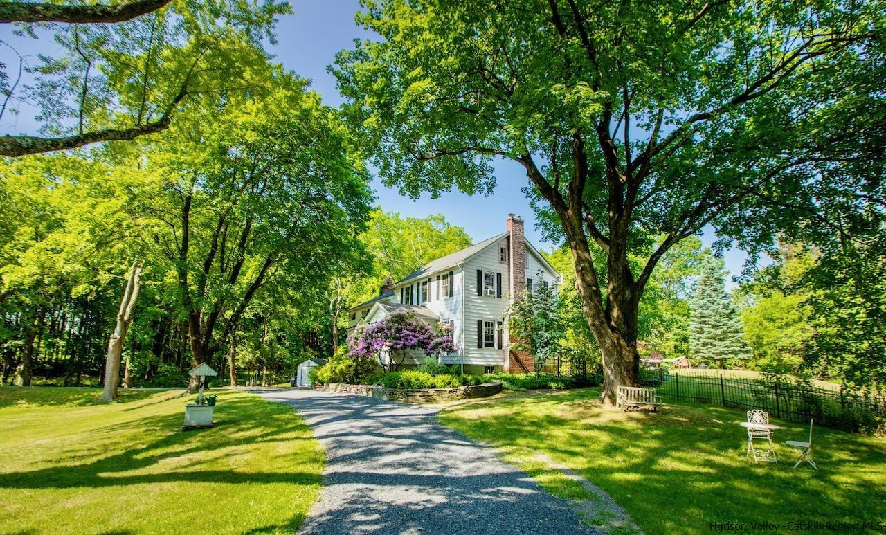 1182 Highway 208 Wallkill, NY 12589 - Photo 32 of 35 a view of a house with a big yard and large trees