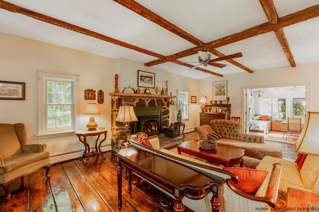 1182 Highway 208 Wallkill, NY 12589 - Photo 9 of 35 a living room with lots of furniture and a large window
