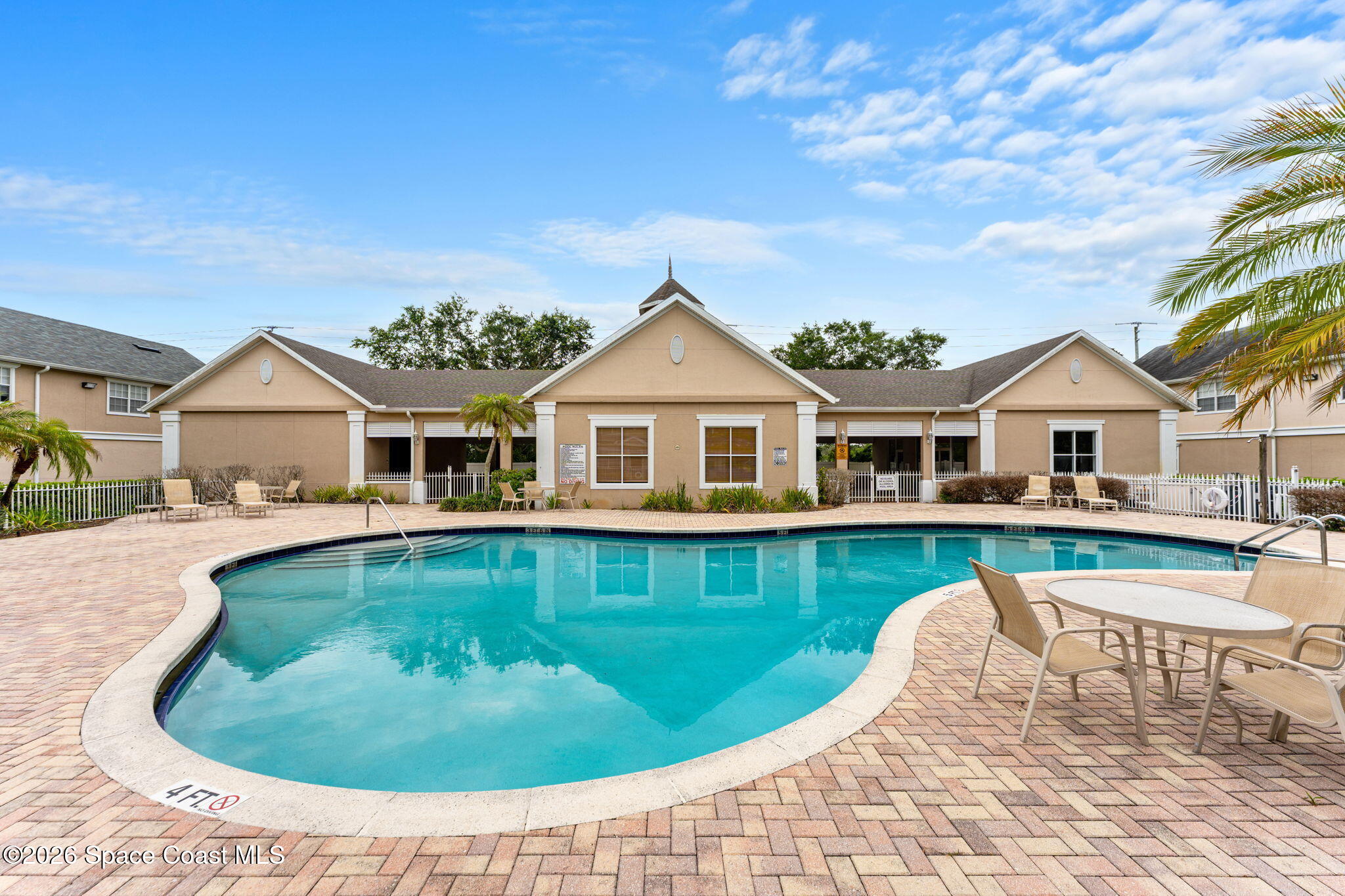 110 Turpial Way, Unit 106 Melbourne, FL 32901 - Photo 44 of 50 a aerial view of a house with swimming pool and porch