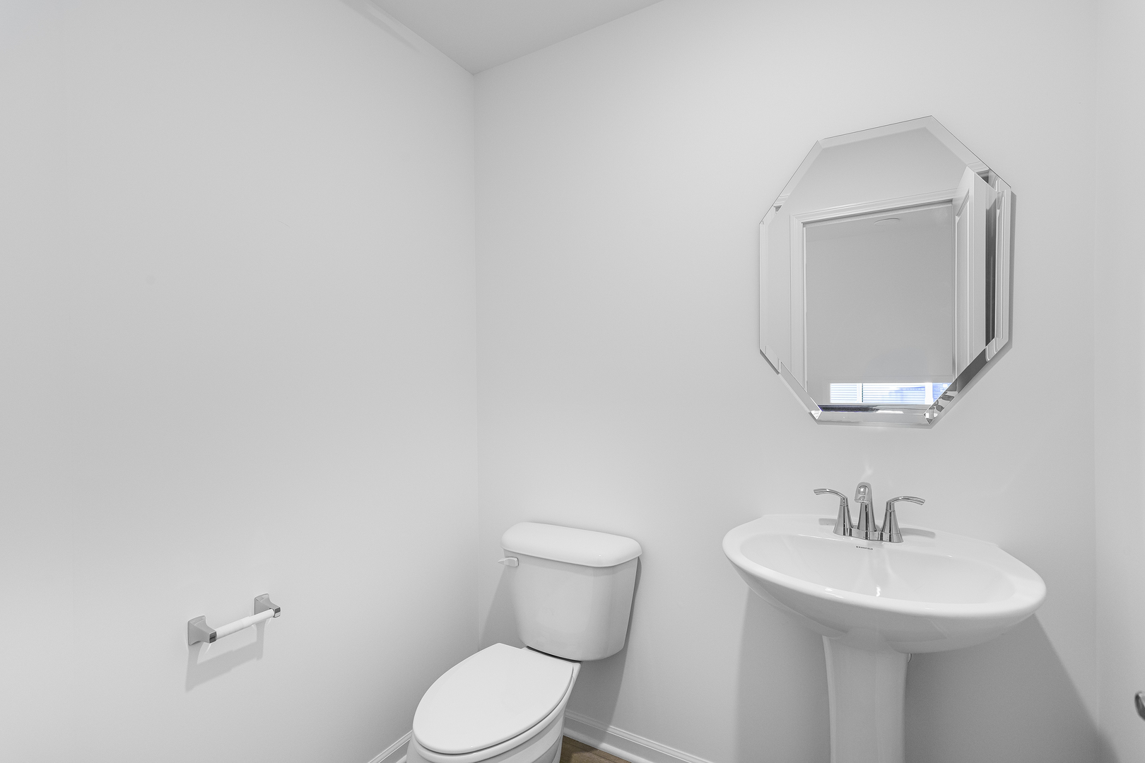 421 Red Oak Circle Volo, IL 60020 - Photo 5 of 12 a bathroom with a toilet a sink and mirror