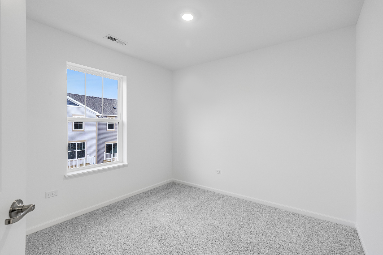 421 Red Oak Circle Volo, IL 60020 - Photo 8 of 12 a view of an empty room with a window