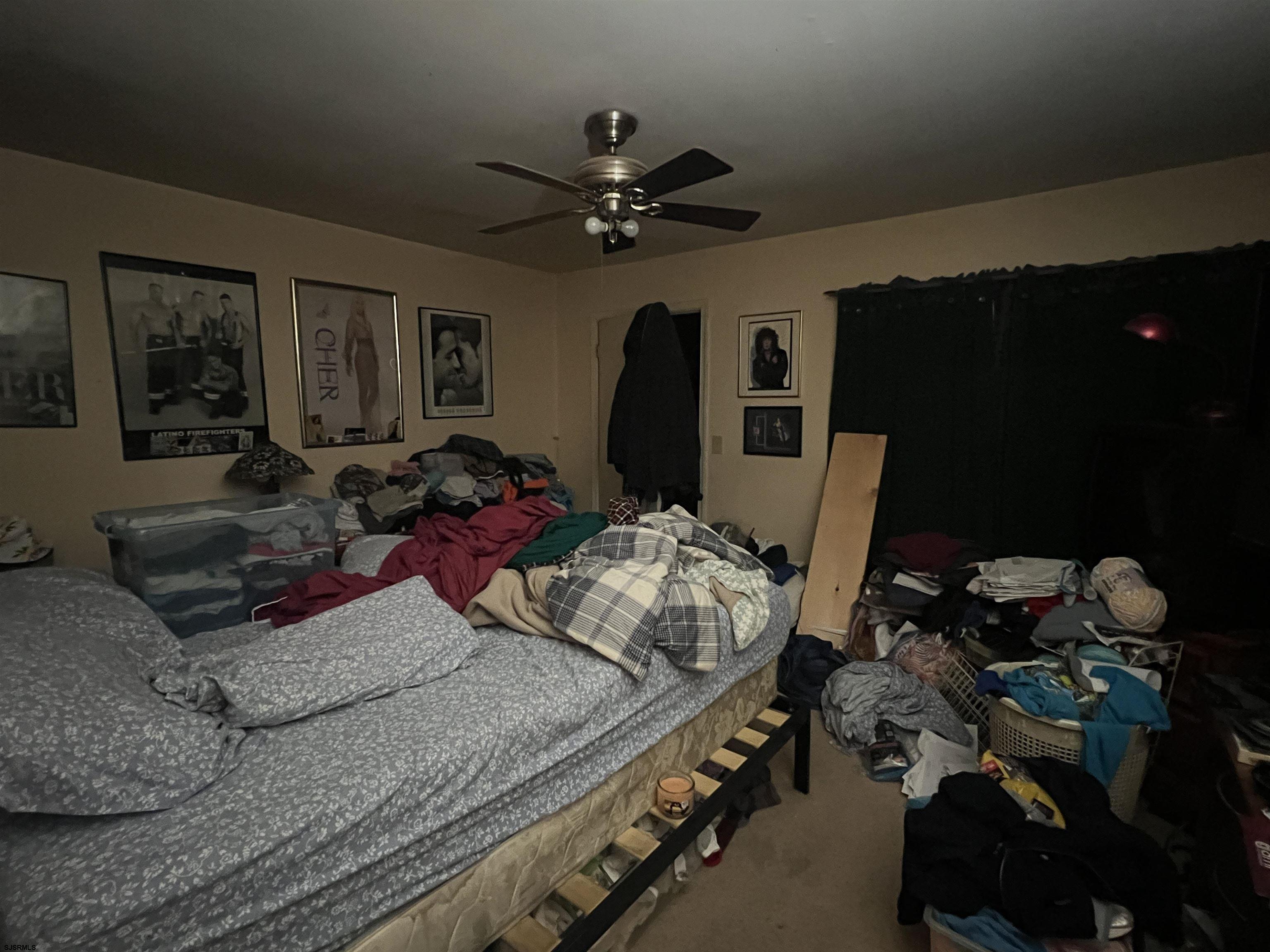 152 Club Place, Unit 152 Galloway Township, NJ 08205 - Photo 12 of 23 a living room with furniture and a flat screen tv