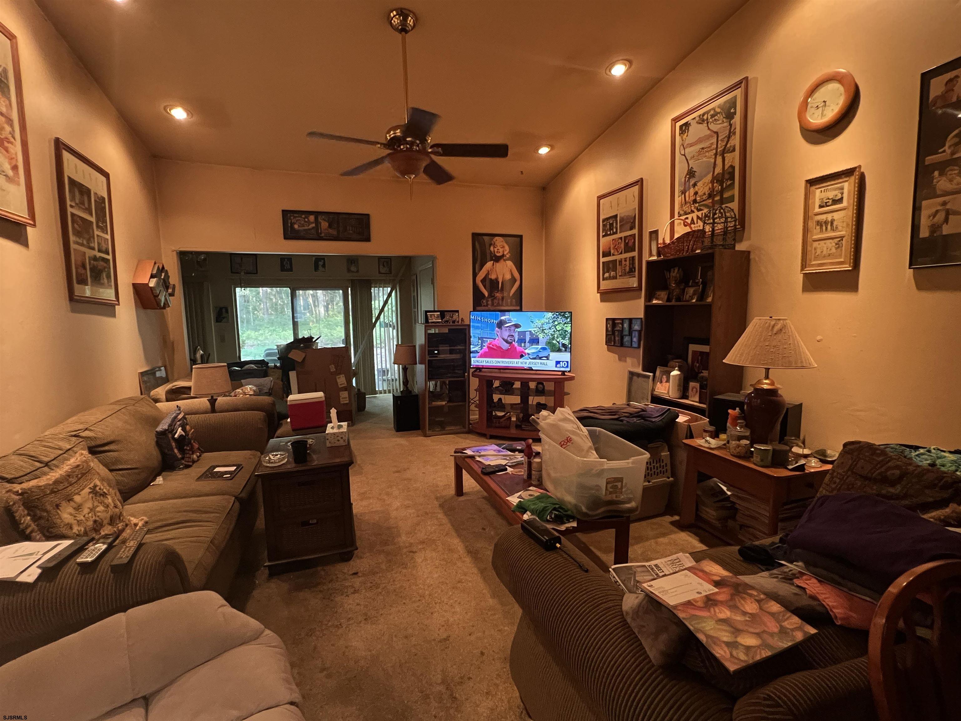 152 Club Place, Unit 152 Galloway Township, NJ 08205 - Photo 4 of 23 a living room with furniture