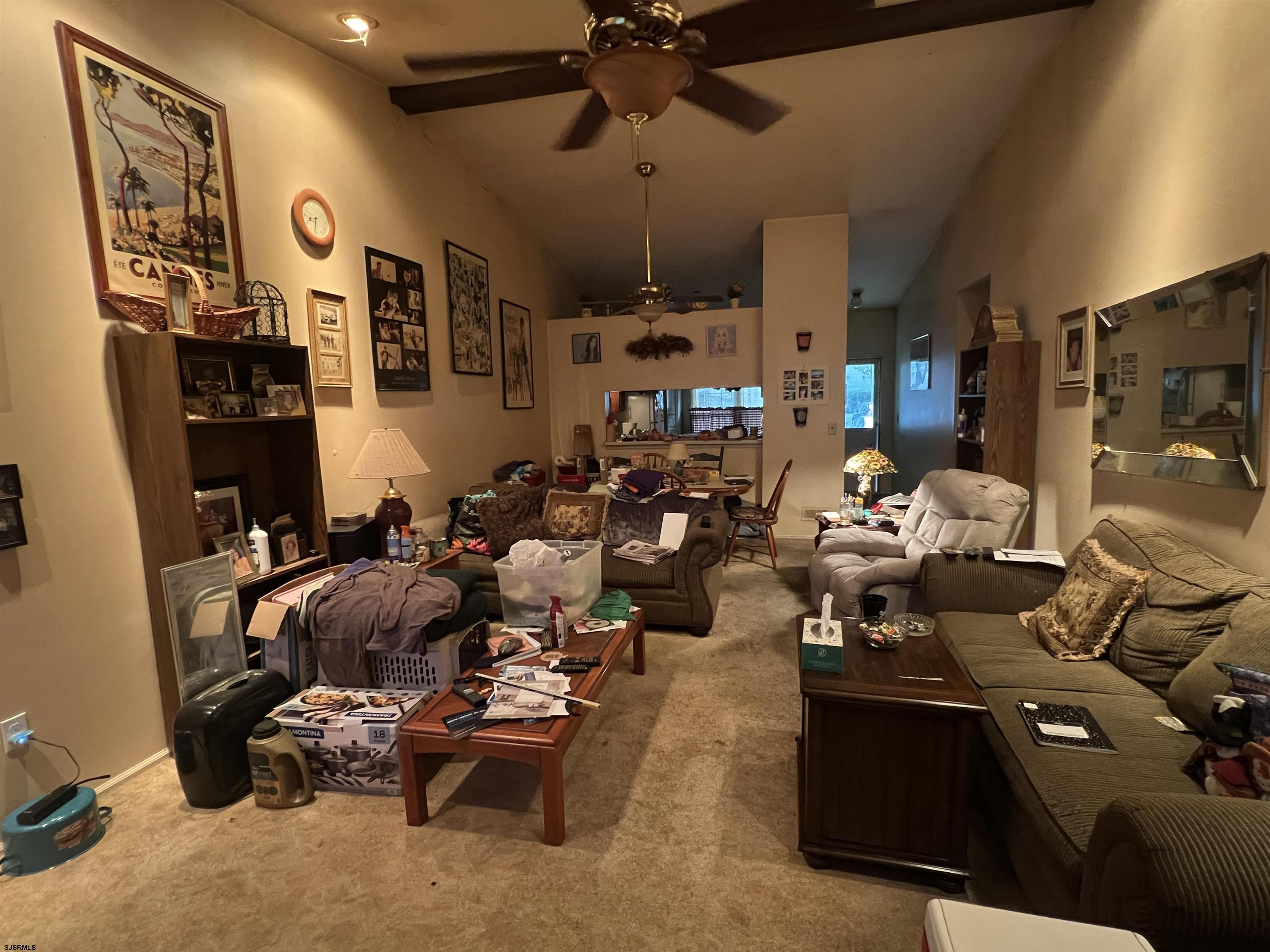 152 Club Place, Unit 152 Galloway Township, NJ 08205 - Photo 6 of 23 a room with gym equipment and a large window