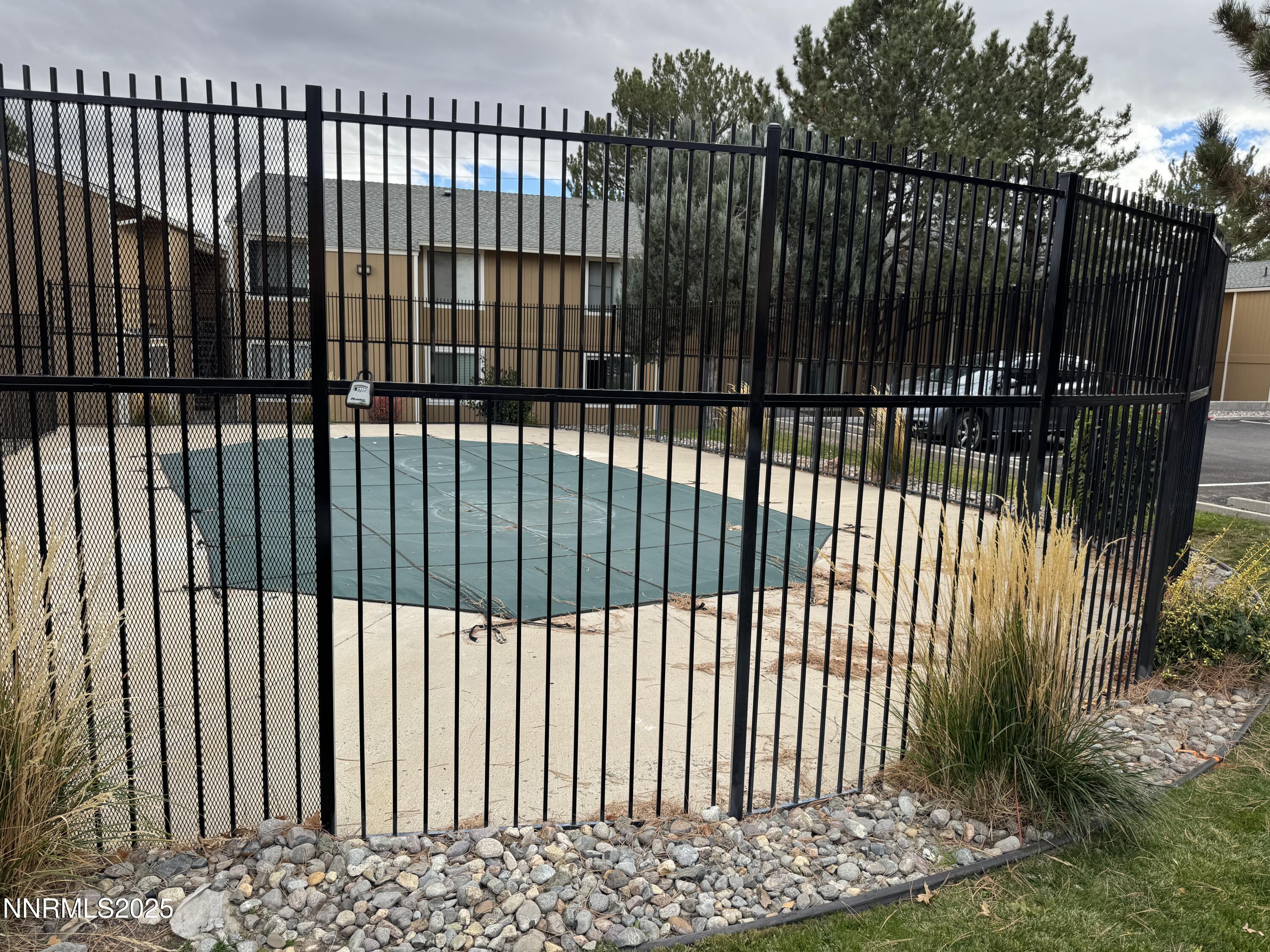 3880 East Leonesio Drive, Unit C2 Reno, NV 89512 - Photo 9 of 10 a view of a black gate