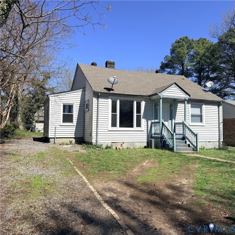 2928 Springview Drive Richmond, VA 23234 - Photo 2 of 15 a front view of a house with a yard