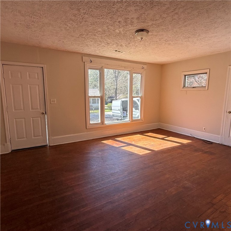 2928 Springview Drive Richmond, VA 23234 - Photo 4 of 15 a view of empty room with wooden floor and fan