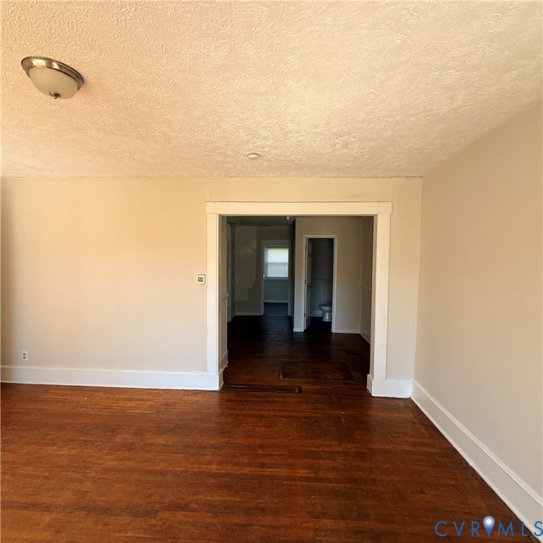 2928 Springview Drive Richmond, VA 23234 - Photo 5 of 15 a view of a room with wooden floor and a ceiling fan