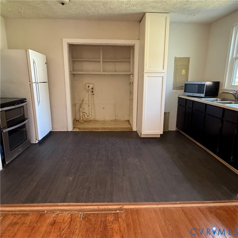 2928 Springview Drive Richmond, VA 23234 - Photo 7 of 15 a view of kitchen with wooden floor and electronic appliances