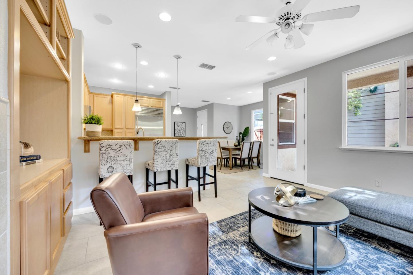 6367 Brando Loop Fair Oaks, CA 95628 - Photo 19 of 59 a living room with furniture and kitchen view