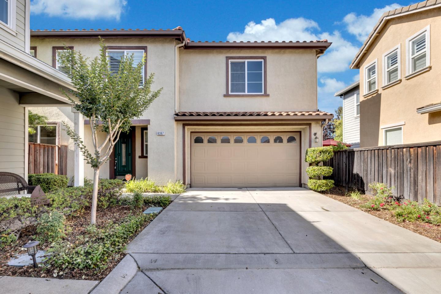 6367 Brando Loop Fair Oaks, CA 95628 - Photo 2 of 59 a front view of a house with a garage