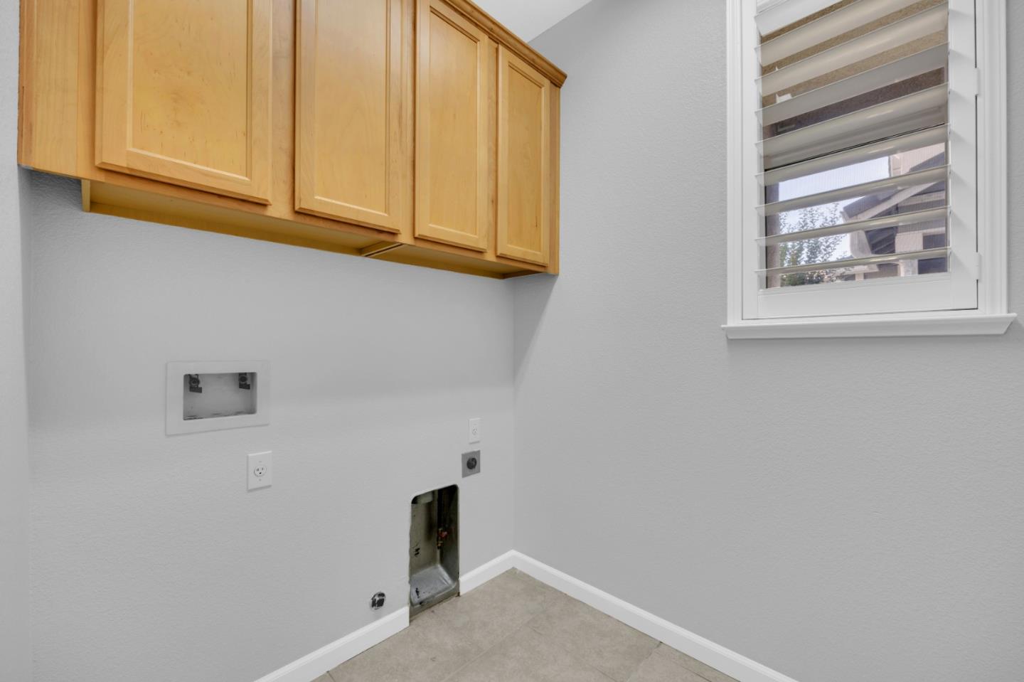 6367 Brando Loop Fair Oaks, CA 95628 - Photo 23 of 59 a view of cabinets and utility room with window