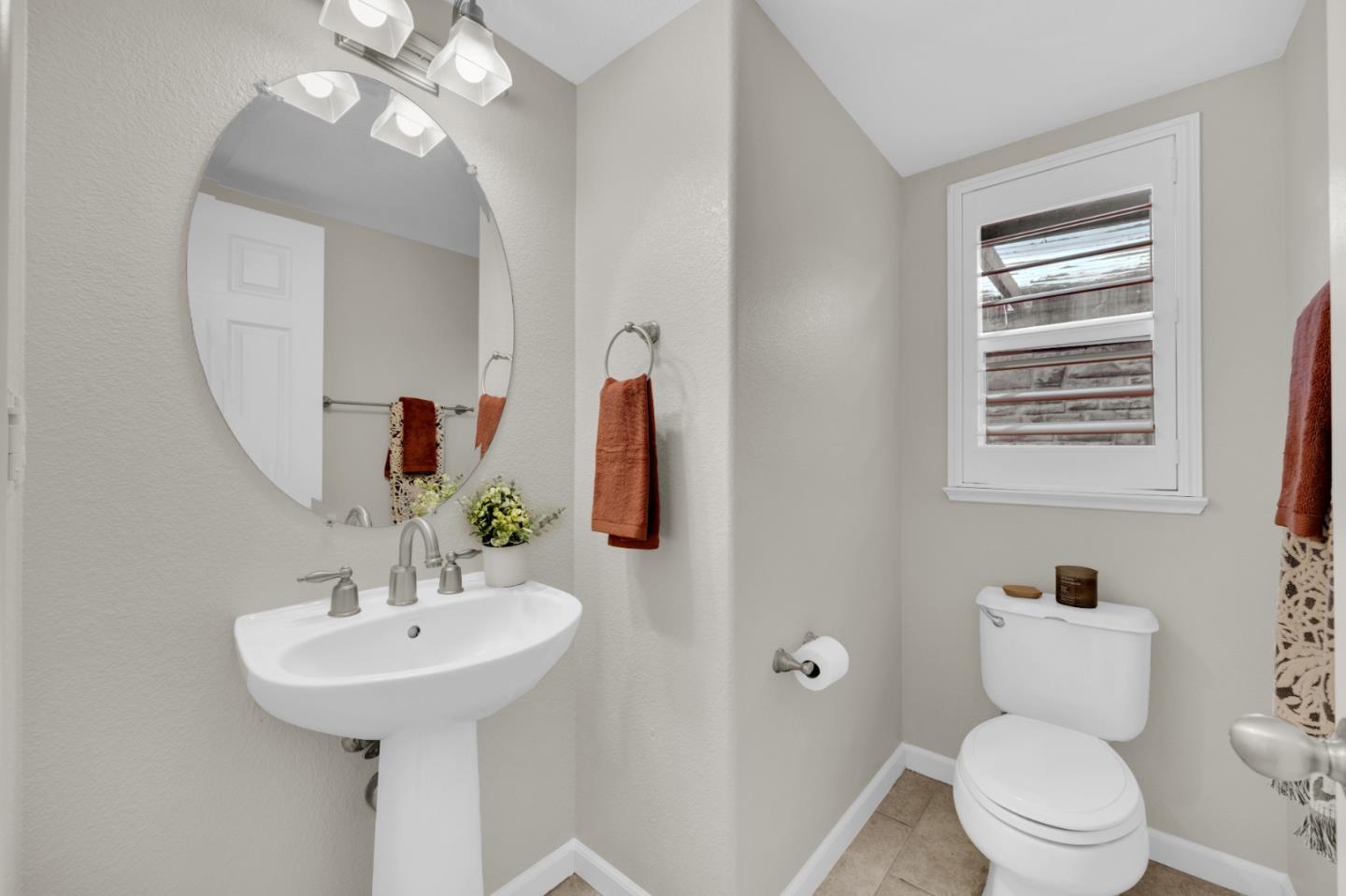 6367 Brando Loop Fair Oaks, CA 95628 - Photo 24 of 59 a bathroom with a toilet sink and mirror