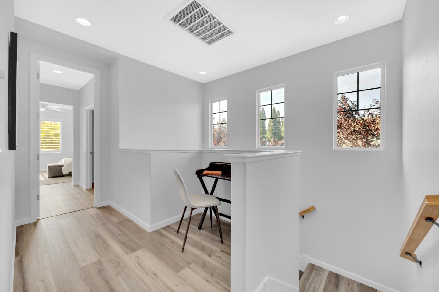6367 Brando Loop Fair Oaks, CA 95628 - Photo 27 of 59 a view of a room with wooden floor and windows