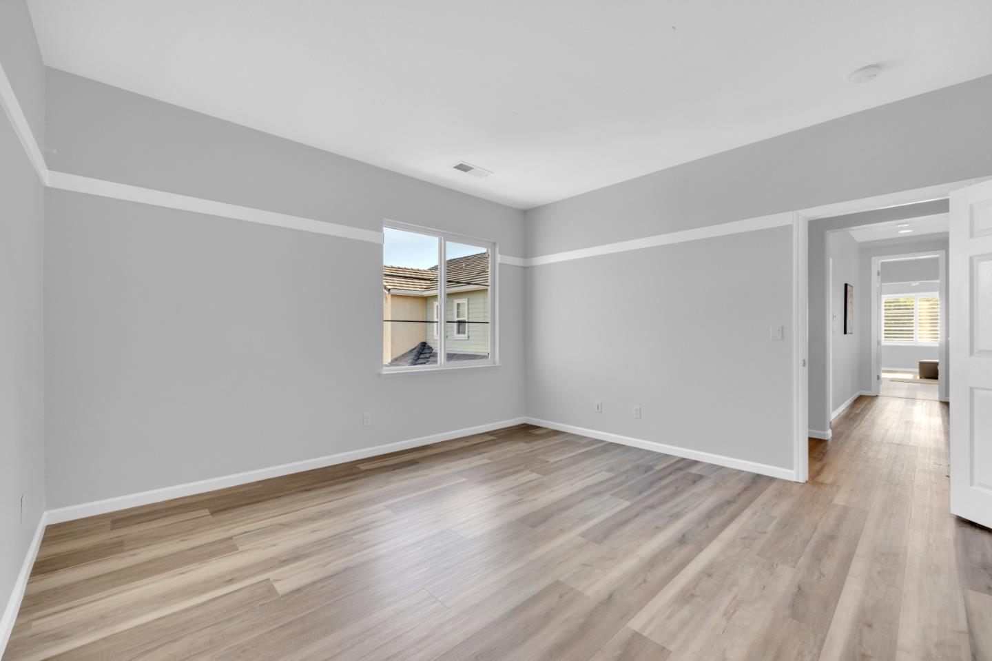 6367 Brando Loop Fair Oaks, CA 95628 - Photo 31 of 59 wooden floor in an empty room with a window