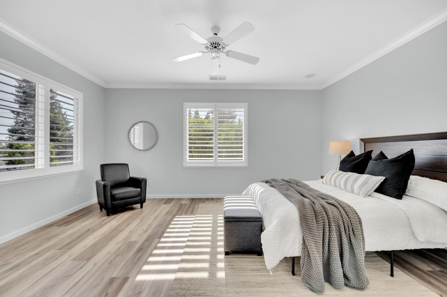 6367 Brando Loop Fair Oaks, CA 95628 - Photo 44 of 59 a bedroom with a bed and a chair