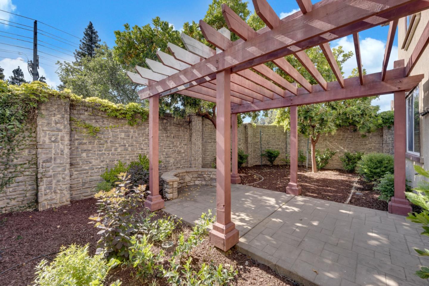 6367 Brando Loop Fair Oaks, CA 95628 - Photo 51 of 59 a view of a patio with table and chairs potted plants