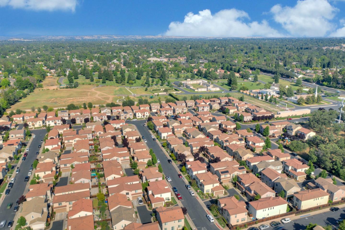 6367 Brando Loop Fair Oaks, CA 95628 - Photo 57 of 59 an aerial view of residential houses with outdoor space and trees