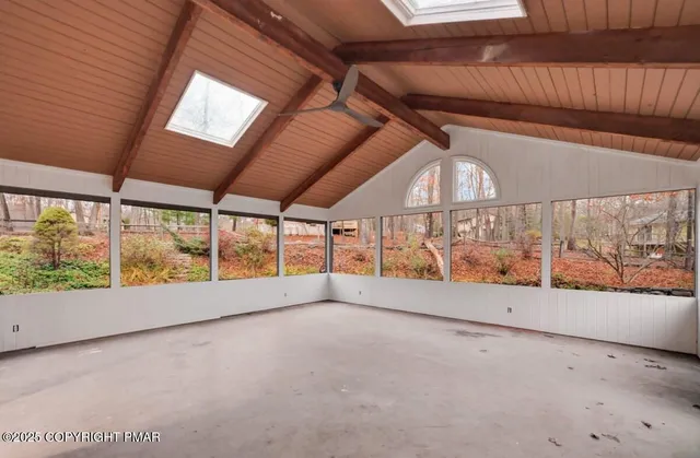 a view of house with backyard space and garden