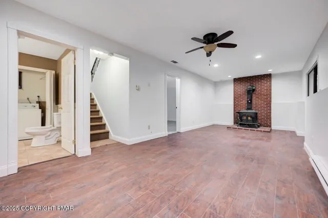 a kitchen with stainless steel appliances granite countertop a stove and a sink