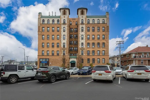 a view of a cars parked in front of a building