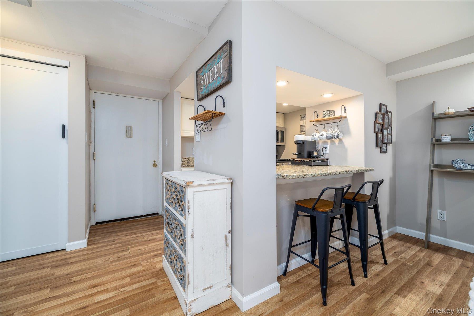 310 Riverside Boulevard, Unit G2 Long Beach, NY 11561 - Photo 6 of 17 Eat in Kitchen with Bar Stools