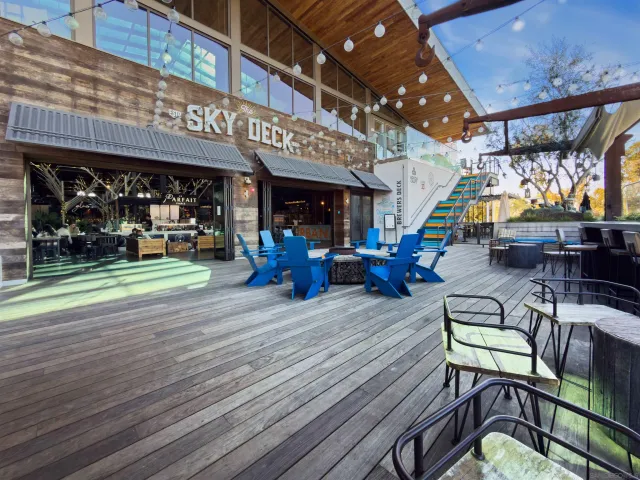 a view of a chairs and table in the patio