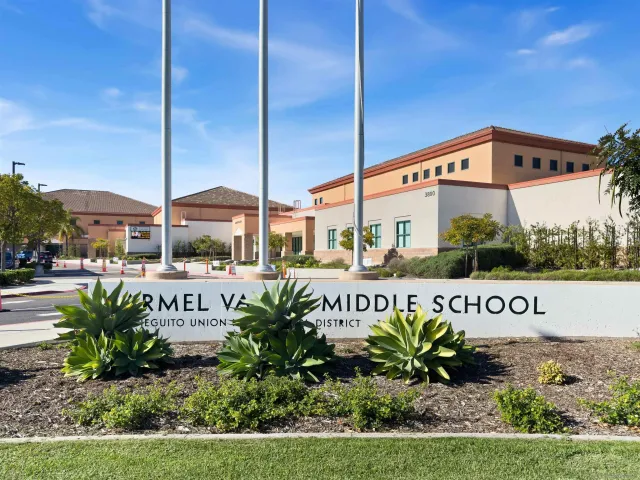 a view of a chairs and table in a patio