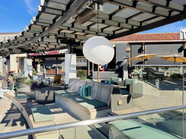 a view of a swimming pool with a lounge chairs