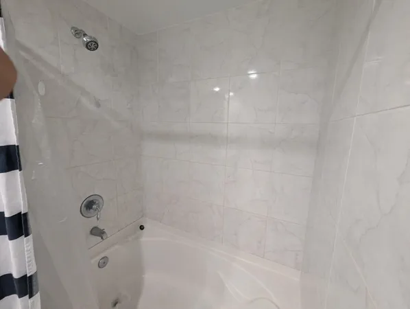 a bathroom with a bathtub