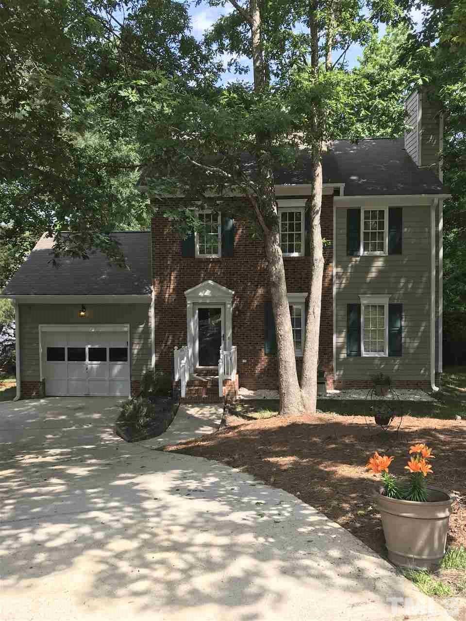 3609 Rubra Circle Raleigh, NC 27616 - Photo 1 of 15 Shaded and wooded lot with spacious parking in addition to 1-car garage.