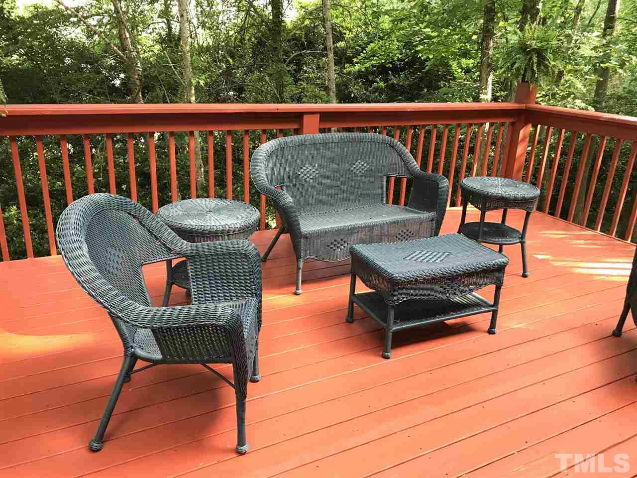 3609 Rubra Circle Raleigh, NC 27616 - Photo 14 of 15 Large shaded deck backing to hardwood trees.