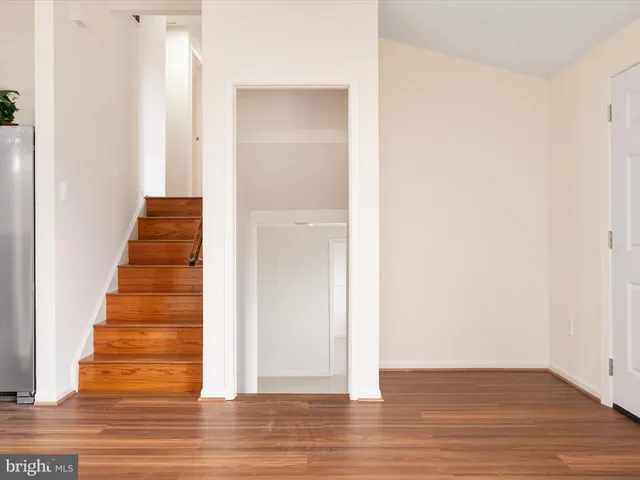 a view of entryway with wooden floor