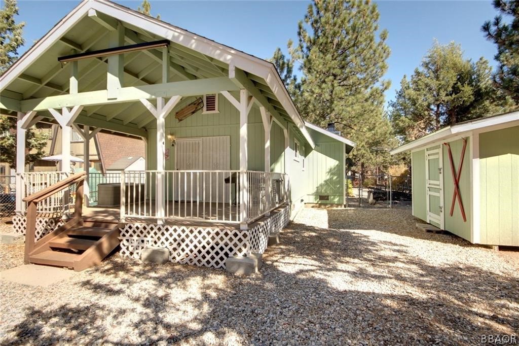 650 Riverside Avenue Sugarloaf, CA 92386 - Photo 13 of 15 a view of a house with a yard