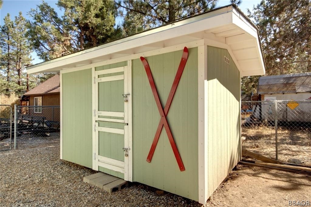 650 Riverside Avenue Sugarloaf, CA 92386 - Photo 15 of 15 a view of a house with wooden stairs