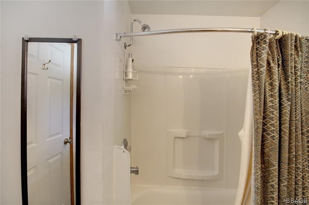 650 Riverside Avenue Sugarloaf, CA 92386 - Photo 9 of 15 a bathroom with a shower