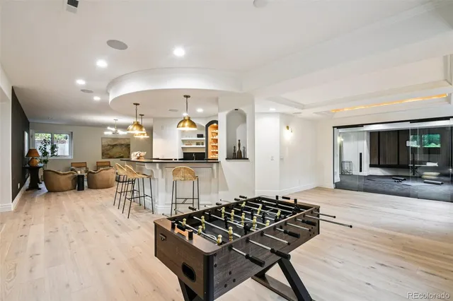 a living room with furniture and a table