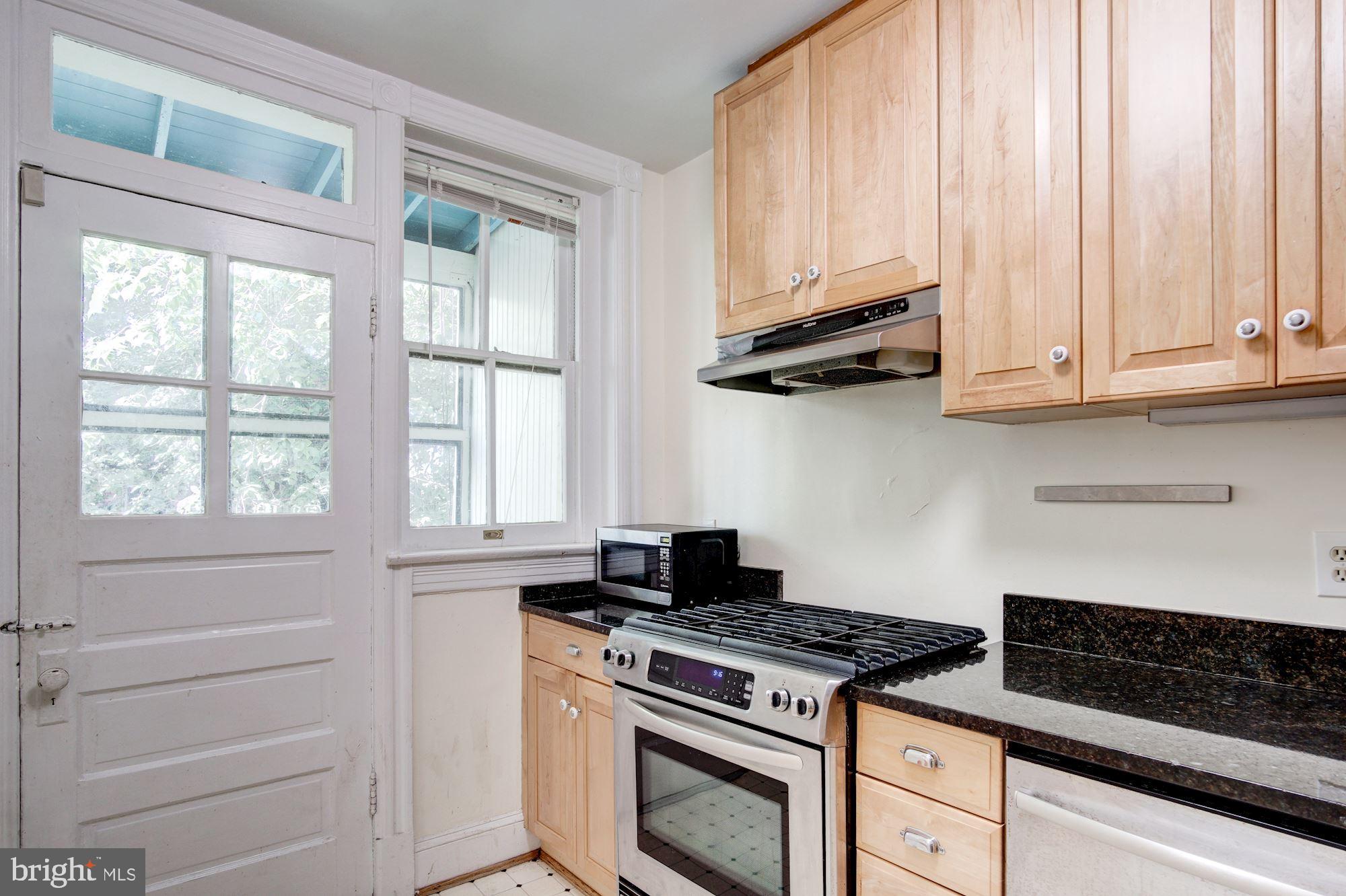 2228 Decatur Place Northwest Washington, DC 20008 - Photo 10 of 20 Kitchen Opens to Sunroom