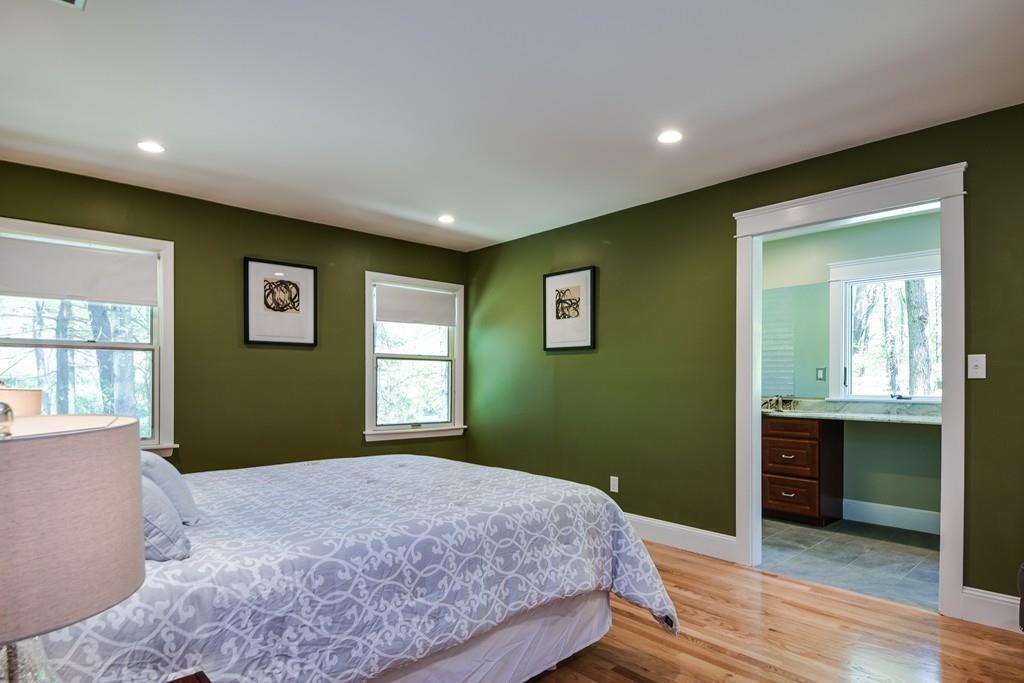 10 Lantern Road Framingham, MA 01702 - Photo 21 of 32 a bedroom with a bed and a window