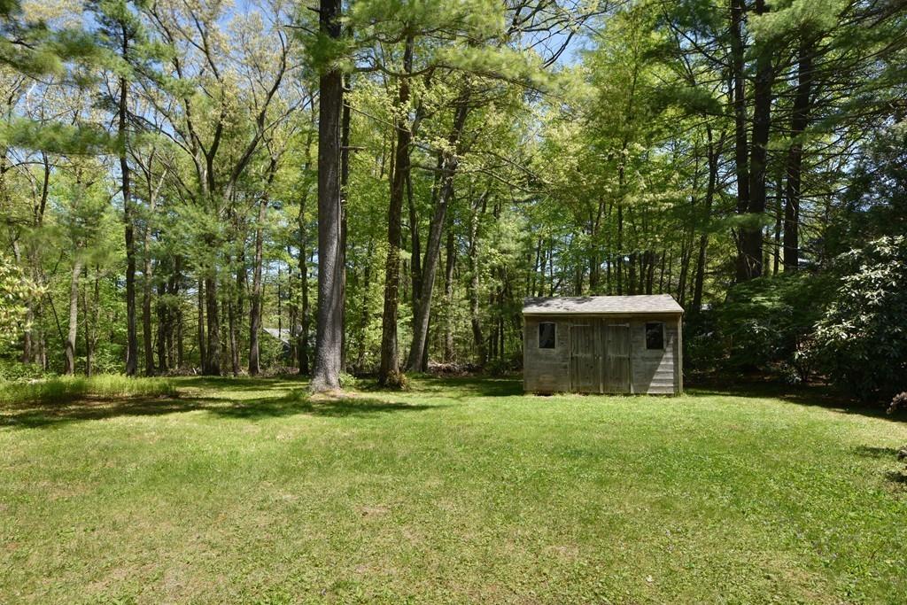 10 Lantern Road Framingham, MA 01702 - Photo 29 of 32 a front view of a house with a yard