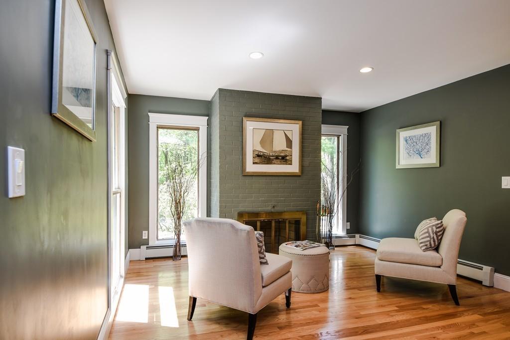 10 Lantern Road Framingham, MA 01702 - Photo 6 of 32 a living room with furniture and a fireplace