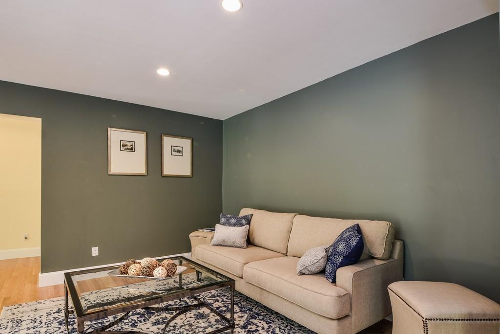 10 Lantern Road Framingham, MA 01702 - Photo 7 of 32 a living room with a couch