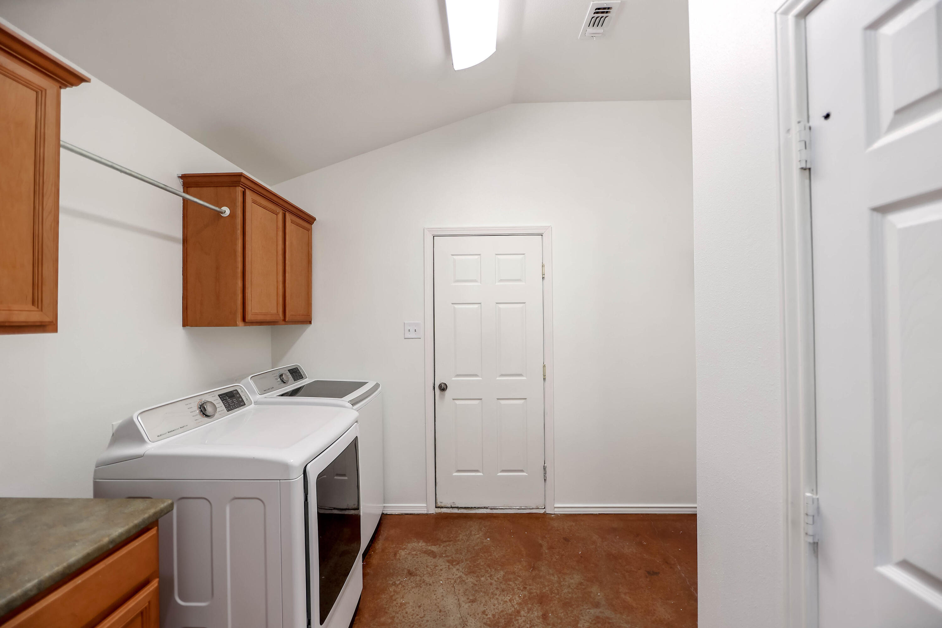 6718 92nd Street Lubbock, TX 79424 - Photo 22 of 31 a bathroom with a sink and a mirror