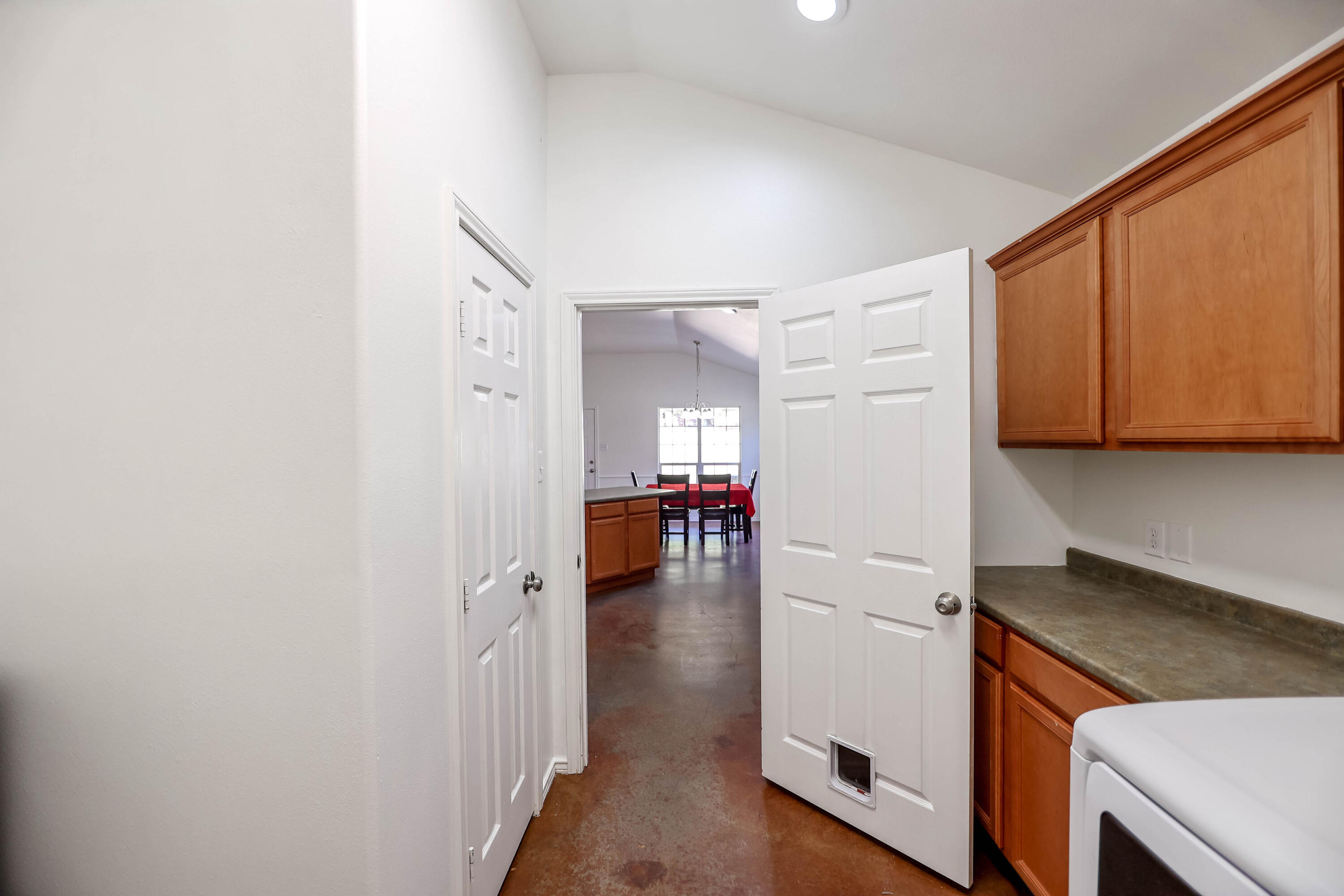 6718 92nd Street Lubbock, TX 79424 - Photo 25 of 31 a view of a kitchen and utility room