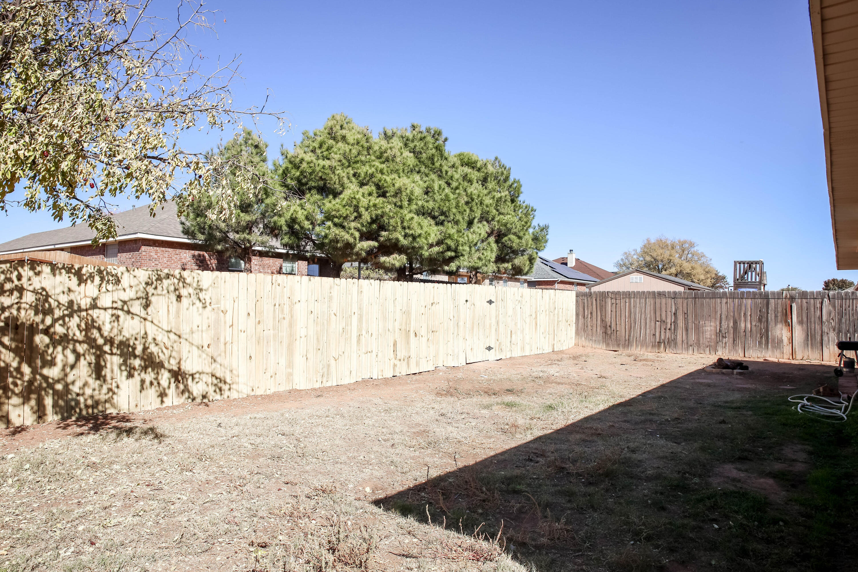 6718 92nd Street Lubbock, TX 79424 - Photo 28 of 31 a view of a backyard of the house