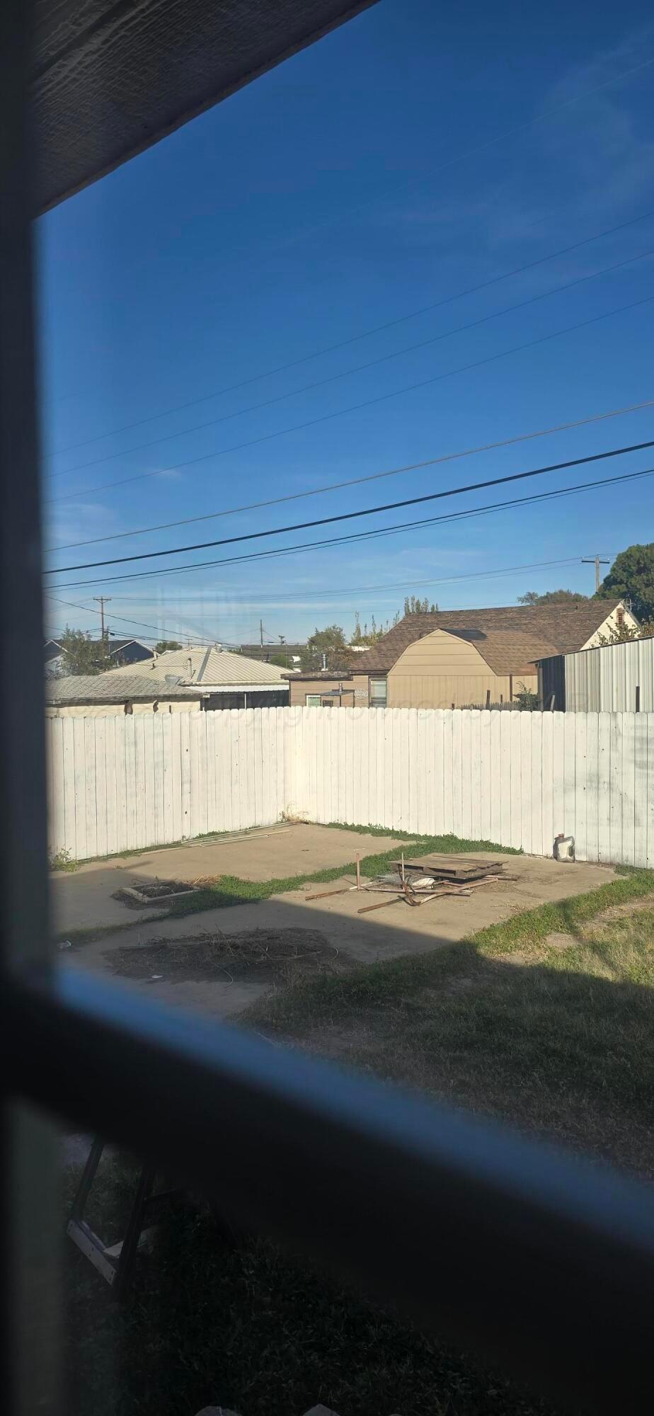 904 Elmore Street Borger, TX 79007 - Photo 19 of 20 a view of a water heater and a floor to ceiling window