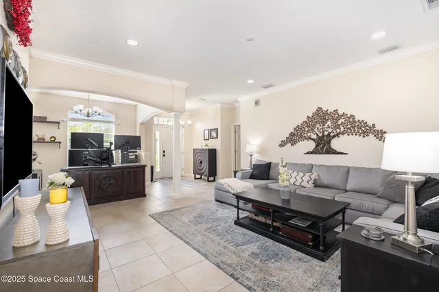 a living room with furniture and a couch