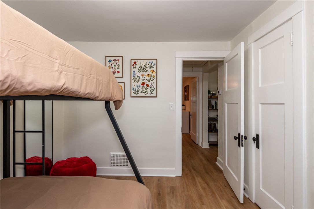 1915 Patterson Road Dayton, OH 45420 - Photo 33 of 48 This cozy bedroom features durable flooring and functional door features, creating a comfortable living space.